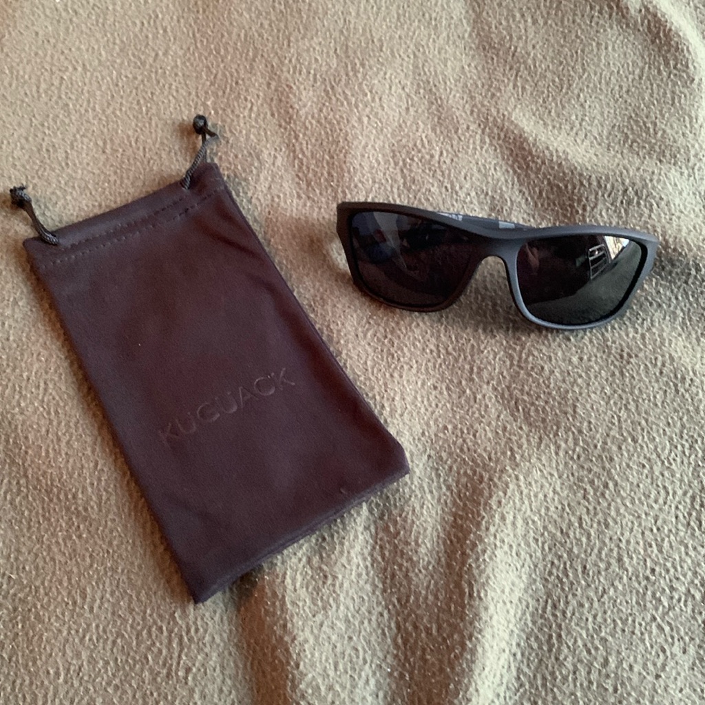 New Kuguack Black Sunglasses With Drawstring Bag.